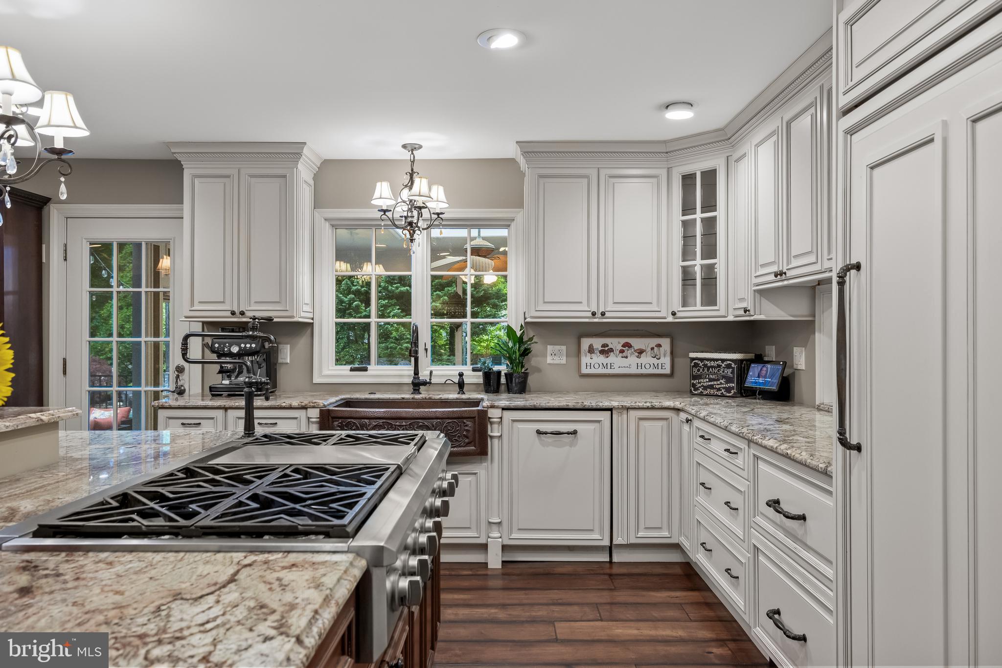 21 Robin Road Moorestown, NJ 08057 - Photo 22 of 82 a kitchen with stainless steel appliances a stove a sink and a refrigerator