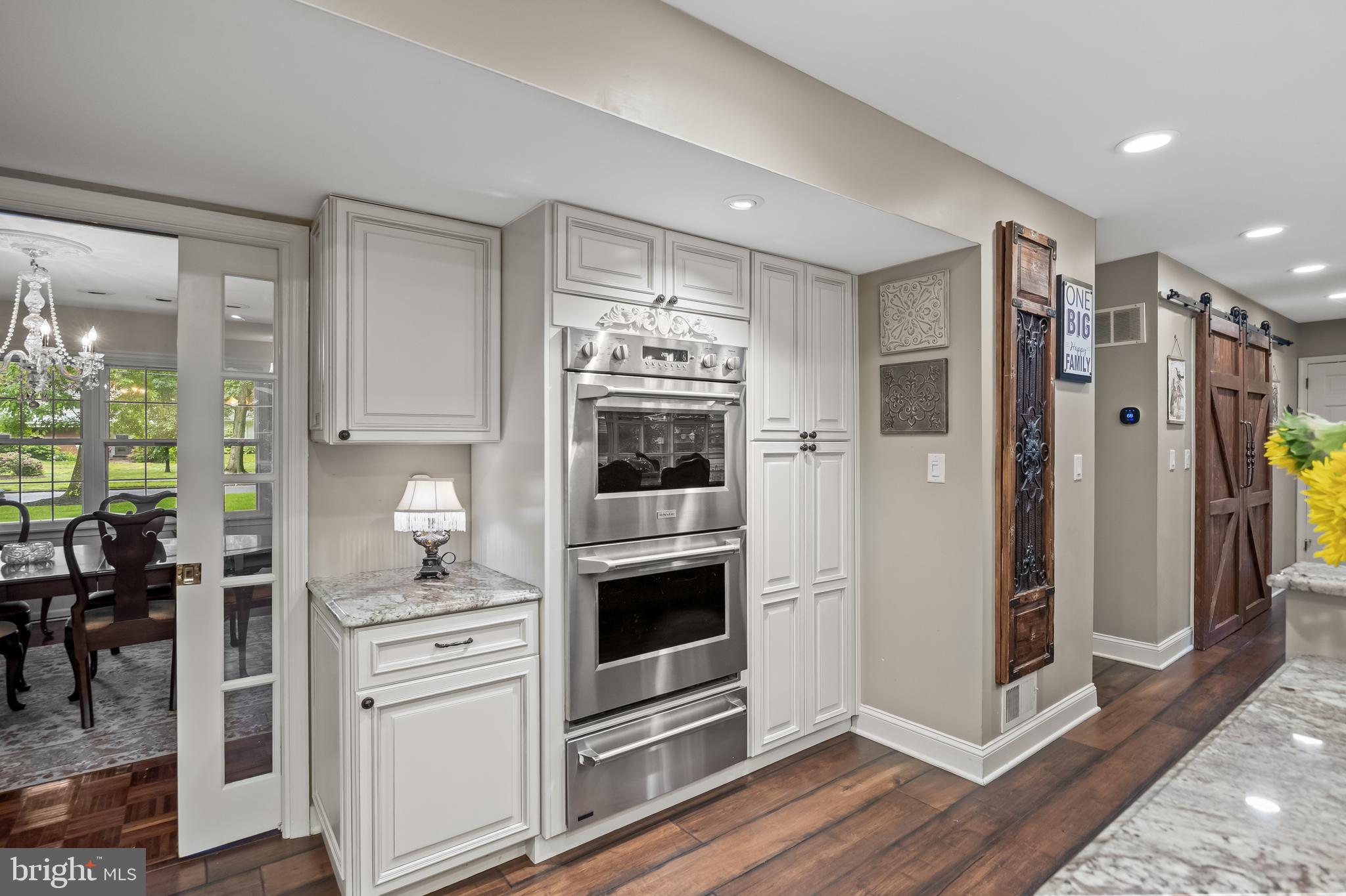 21 Robin Road Moorestown, NJ 08057 - Photo 28 of 82 a kitchen with stainless steel appliances a refrigerator stove and cabinets