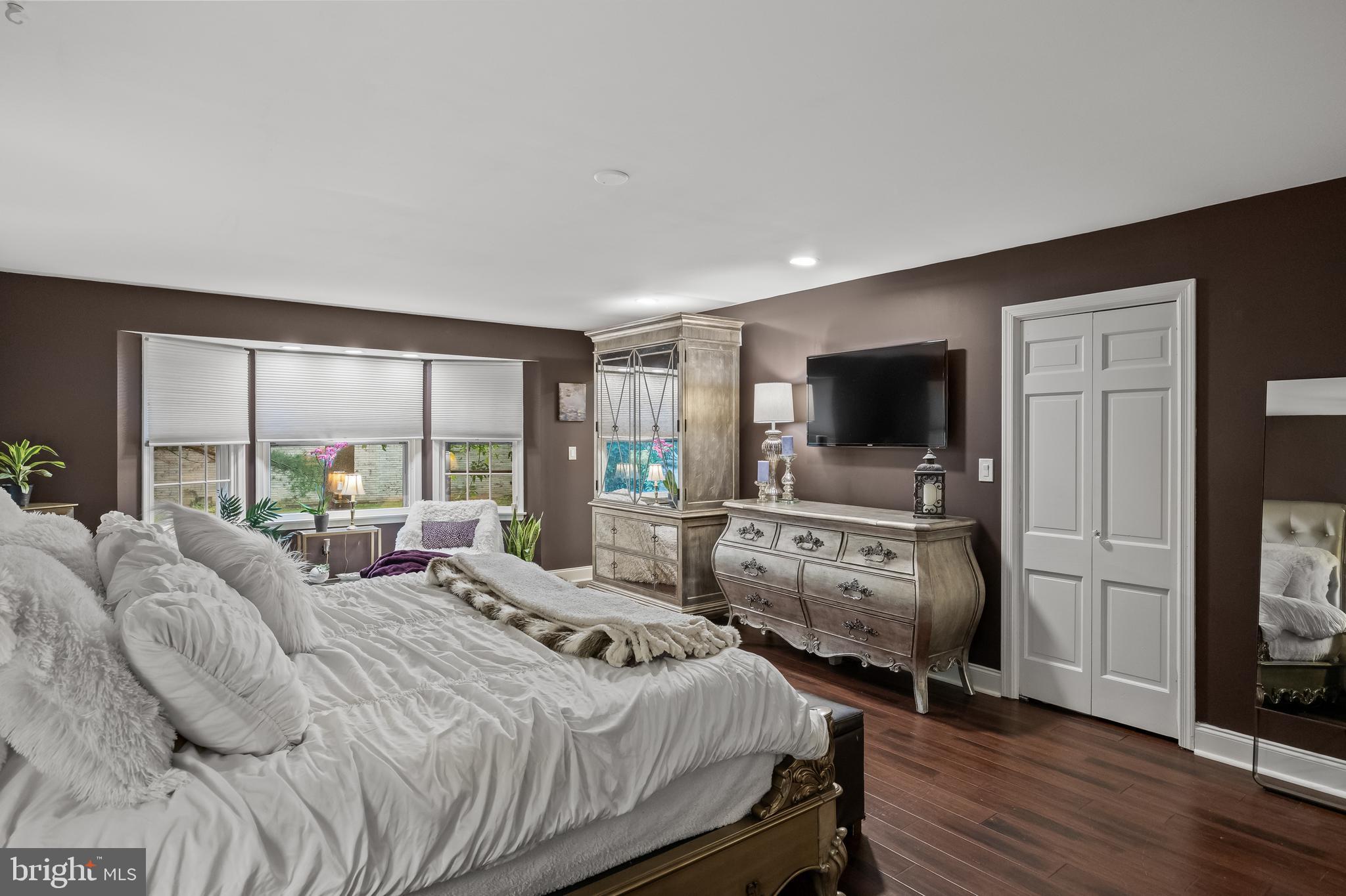 21 Robin Road Moorestown, NJ 08057 - Photo 38 of 82 a bedroom with a bed and a flat screen tv