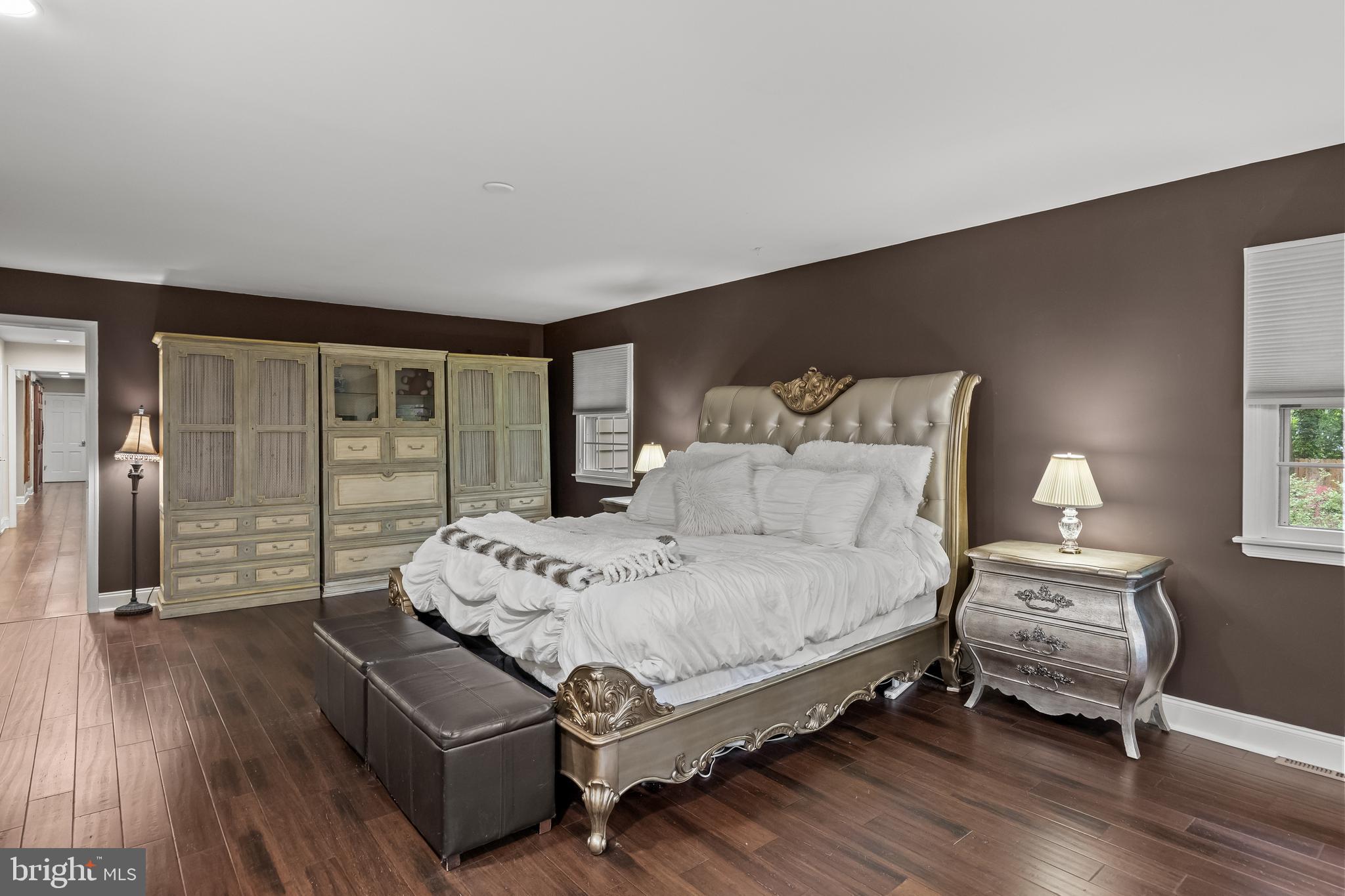 21 Robin Road Moorestown, NJ 08057 - Photo 39 of 82 a spacious bedroom with a bed and wooden floor