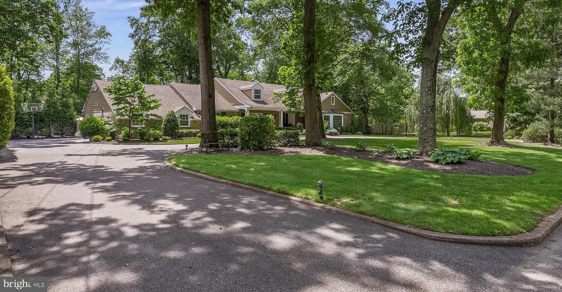 21 Robin Road Moorestown, NJ 08057 - Photo 4 of 82 a view of a street with a house in the background