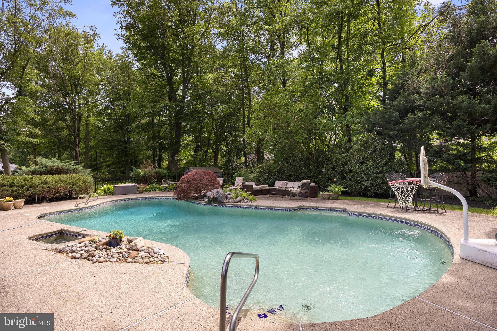 21 Robin Road Moorestown, NJ 08057 - Photo 66 of 82 a view of a swimming pool with a patio