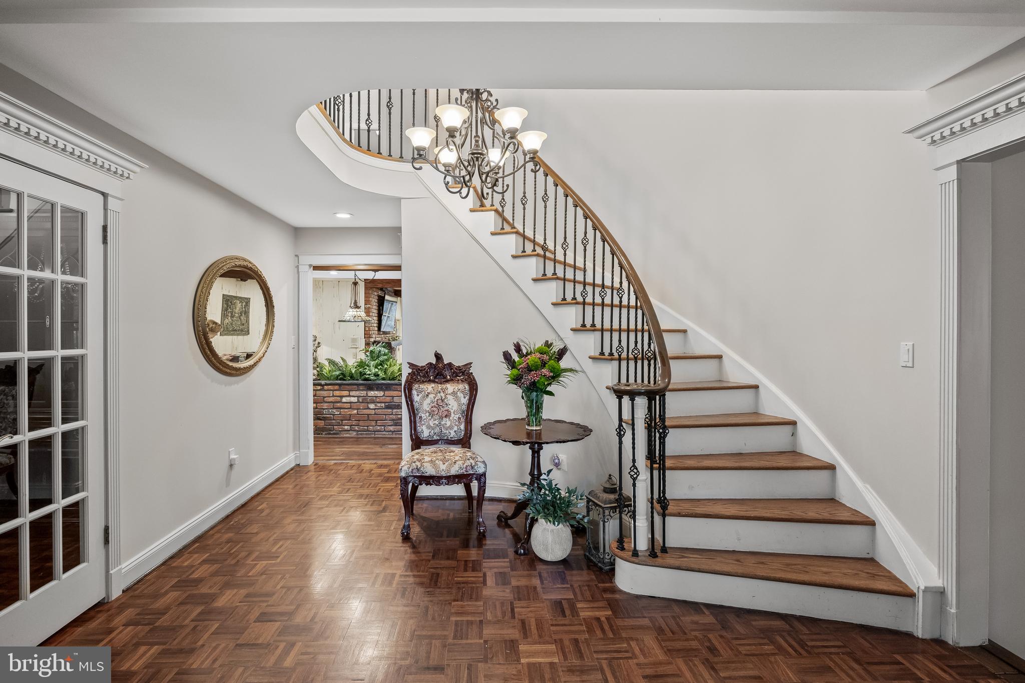 21 Robin Road Moorestown, NJ 08057 - Photo 7 of 82 a view of entryway with wooden floor and window