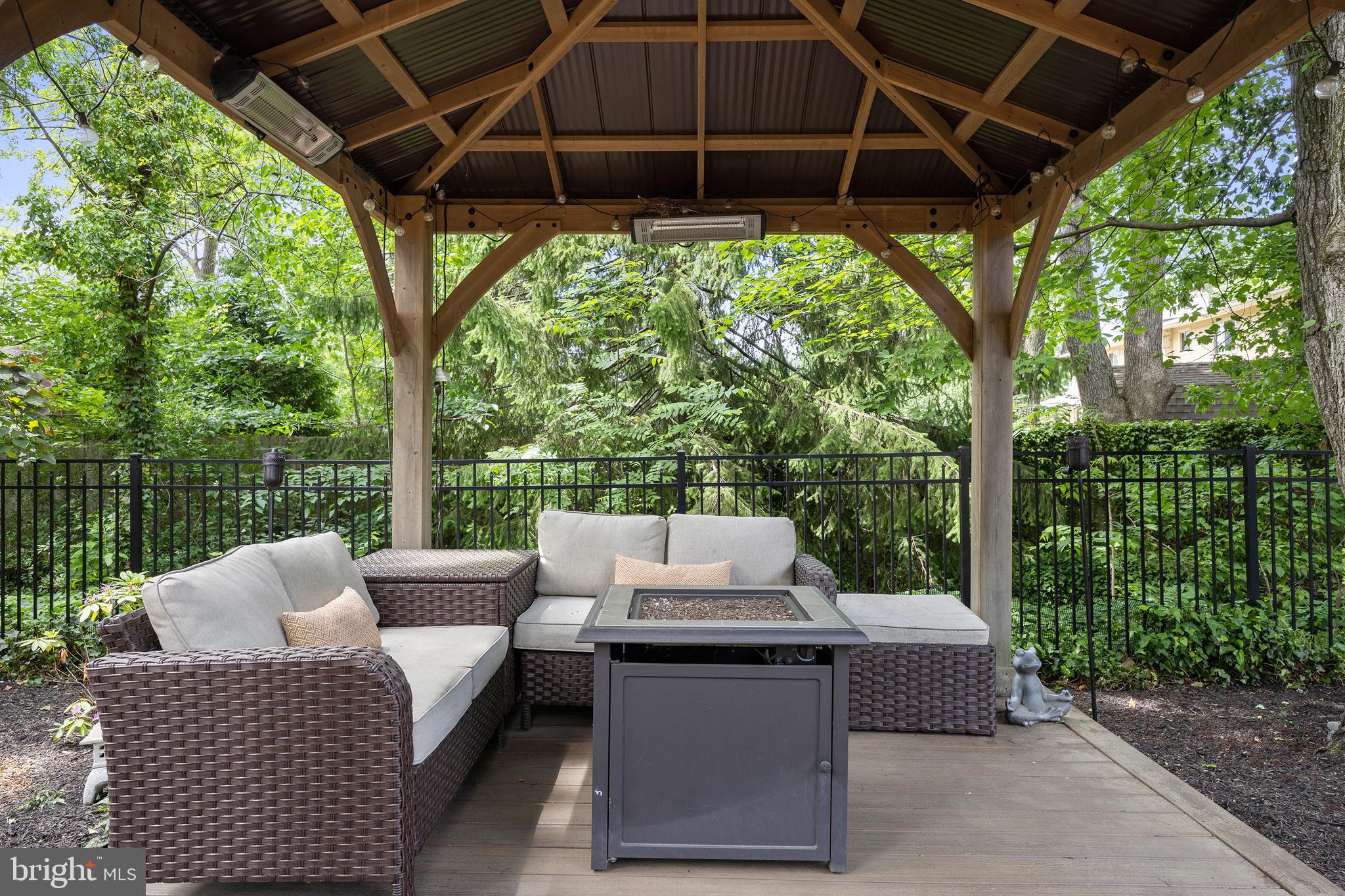 21 Robin Road Moorestown, NJ 08057 - Photo 71 of 82 a view of a patio with couches chairs potted plants and a large tree