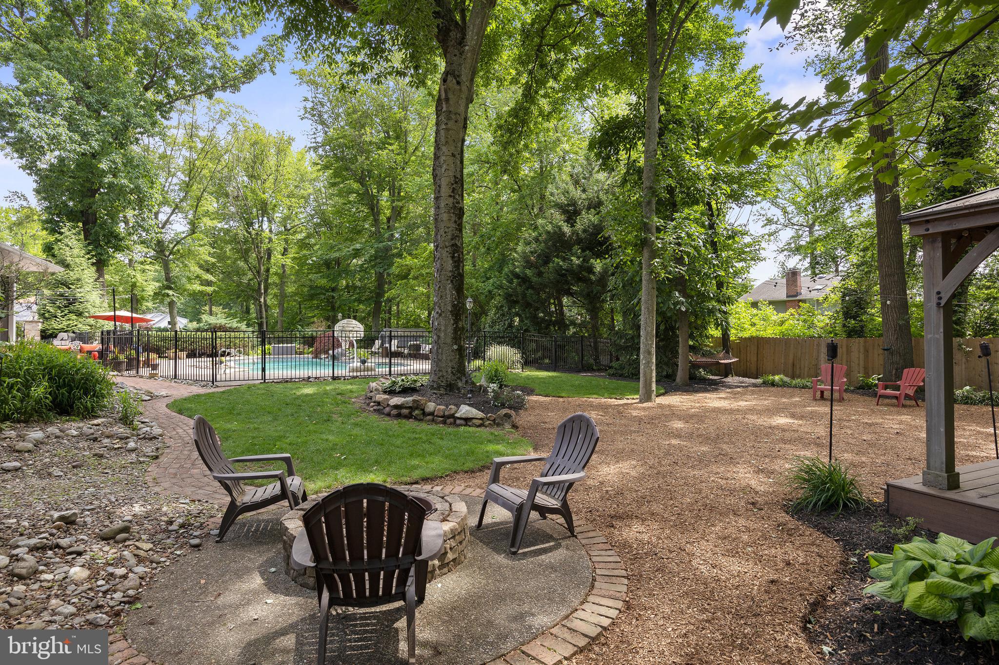 21 Robin Road Moorestown, NJ 08057 - Photo 72 of 82 a view of a patio with chairs and a yard