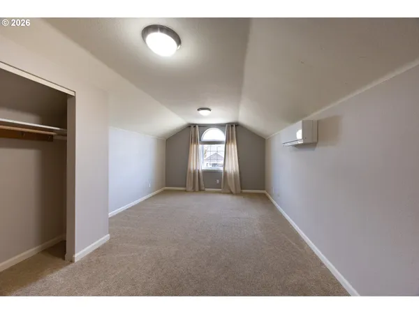 a view of empty room with windows