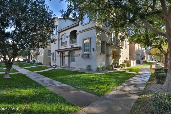 a view of a yard in front of a house