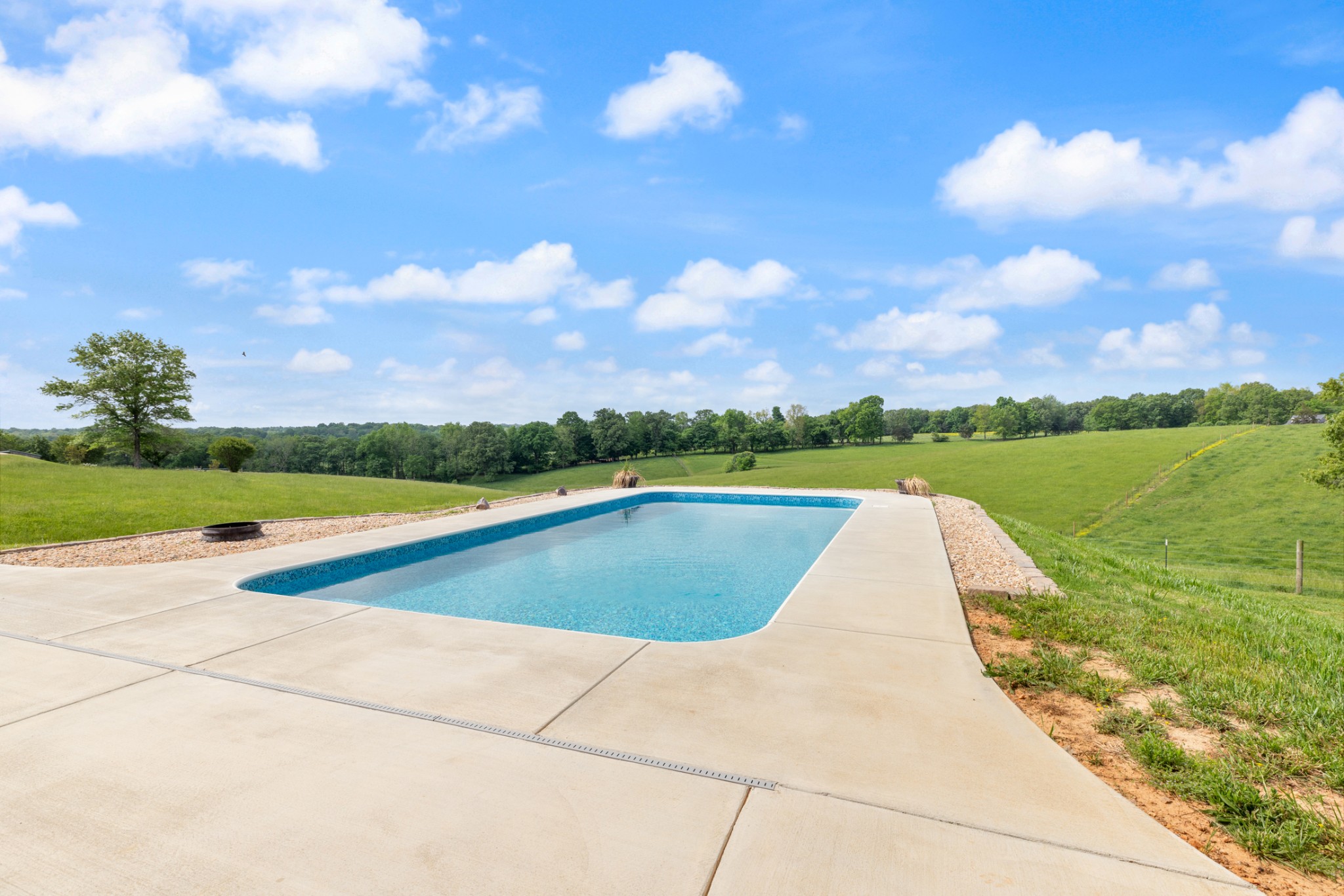 532 South Tidwell Road Bon Aqua, TN 37025 - Photo 15 of 100 a view of a swimming pool and an outdoor seating