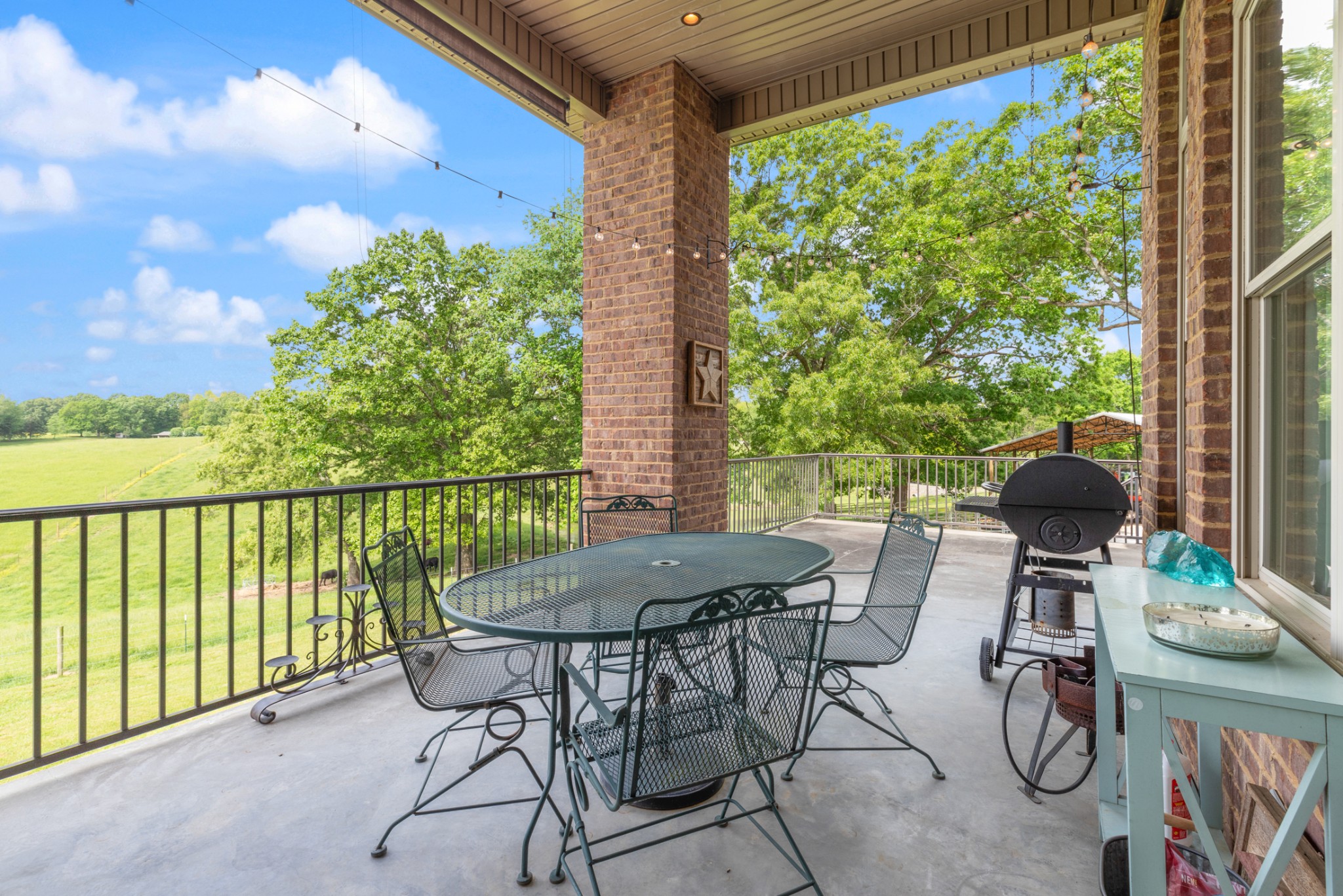 532 South Tidwell Road Bon Aqua, TN 37025 - Photo 18 of 100 a view of a patio with table and chairs and potted plants