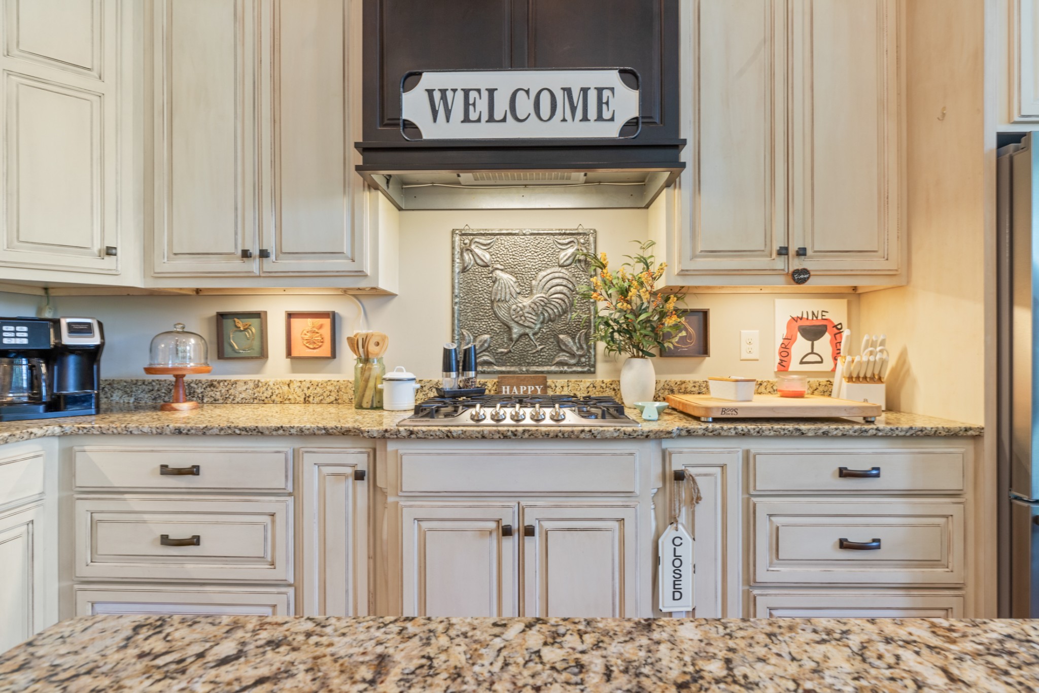 532 South Tidwell Road Bon Aqua, TN 37025 - Photo 29 of 100 a kitchen with granite countertop white cabinets and white appliances