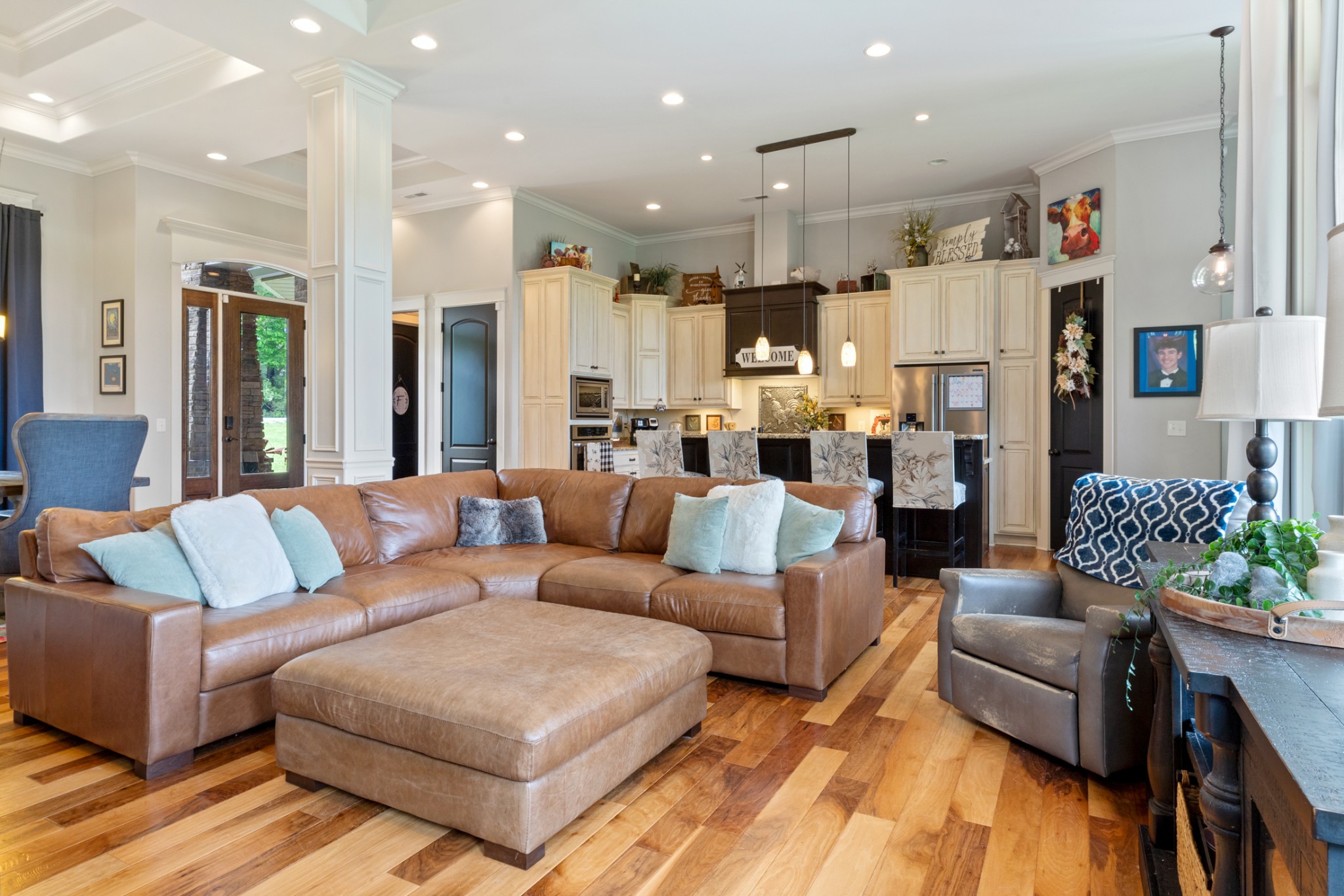 532 South Tidwell Road Bon Aqua, TN 37025 - Photo 37 of 100 a living room with furniture kitchen view and a chandelier