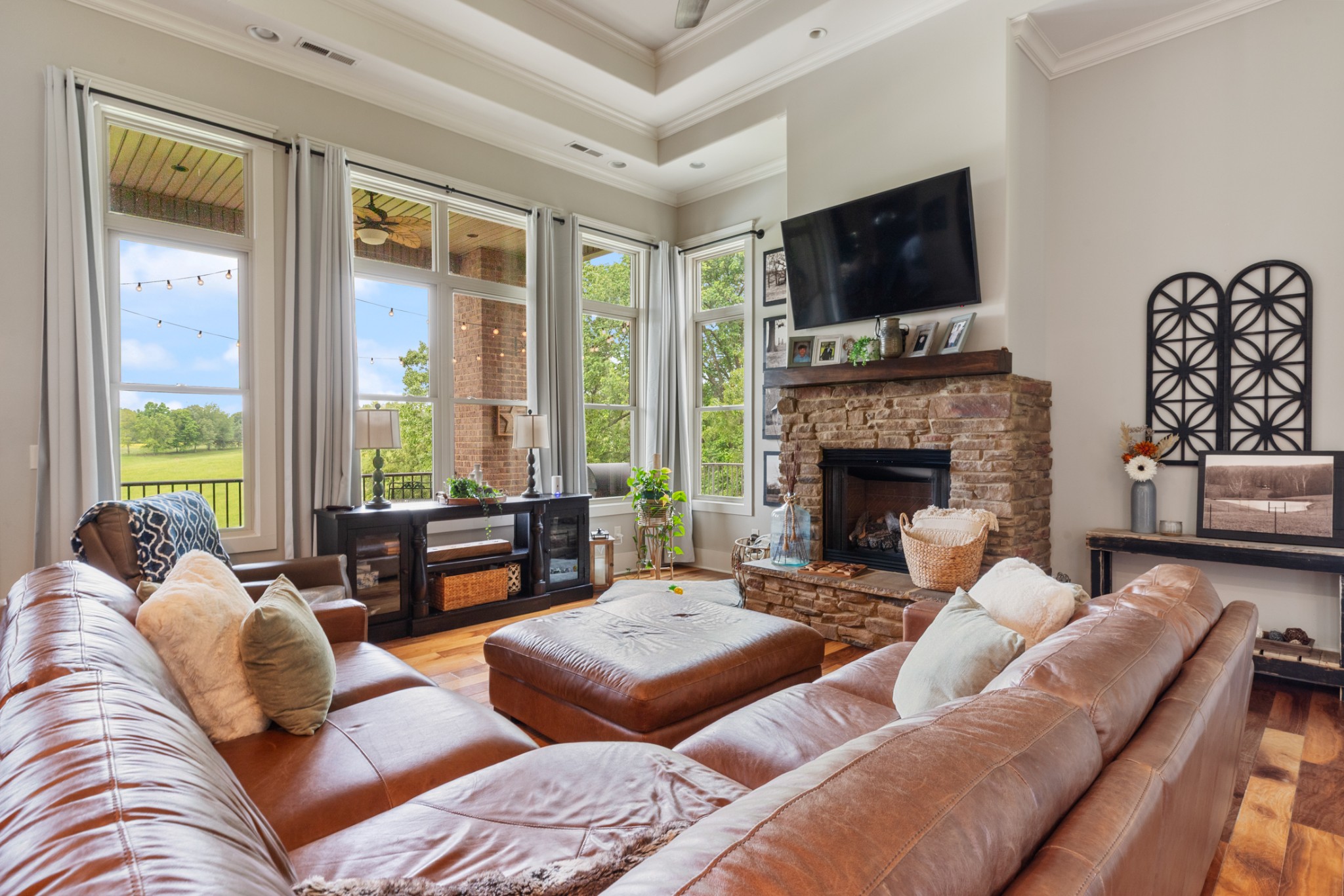 532 South Tidwell Road Bon Aqua, TN 37025 - Photo 39 of 100 a living room with furniture fireplace and flat screen tv