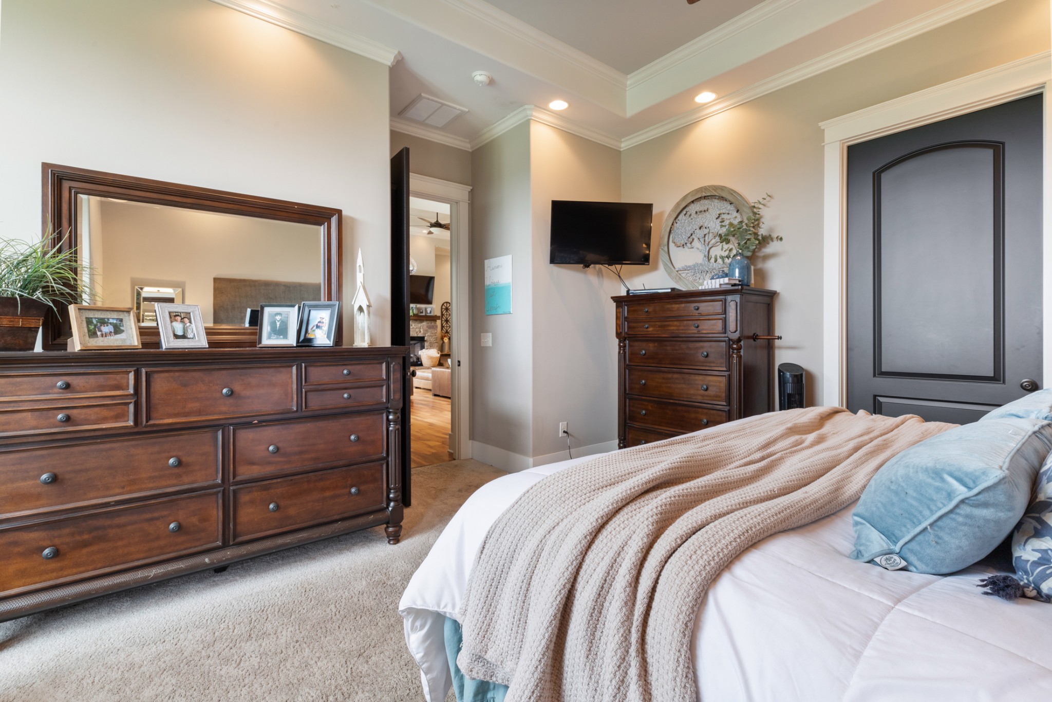 532 South Tidwell Road Bon Aqua, TN 37025 - Photo 43 of 100 a bedroom with a bed and a mirror on dresser