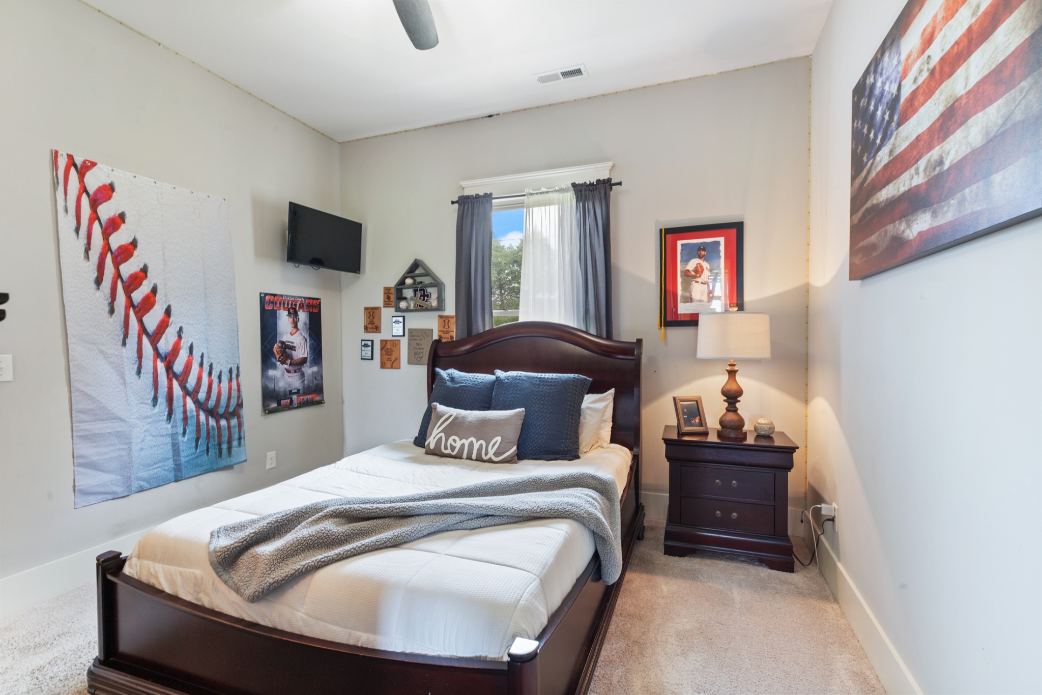 532 South Tidwell Road Bon Aqua, TN 37025 - Photo 49 of 100 a bedroom with a bed and a window