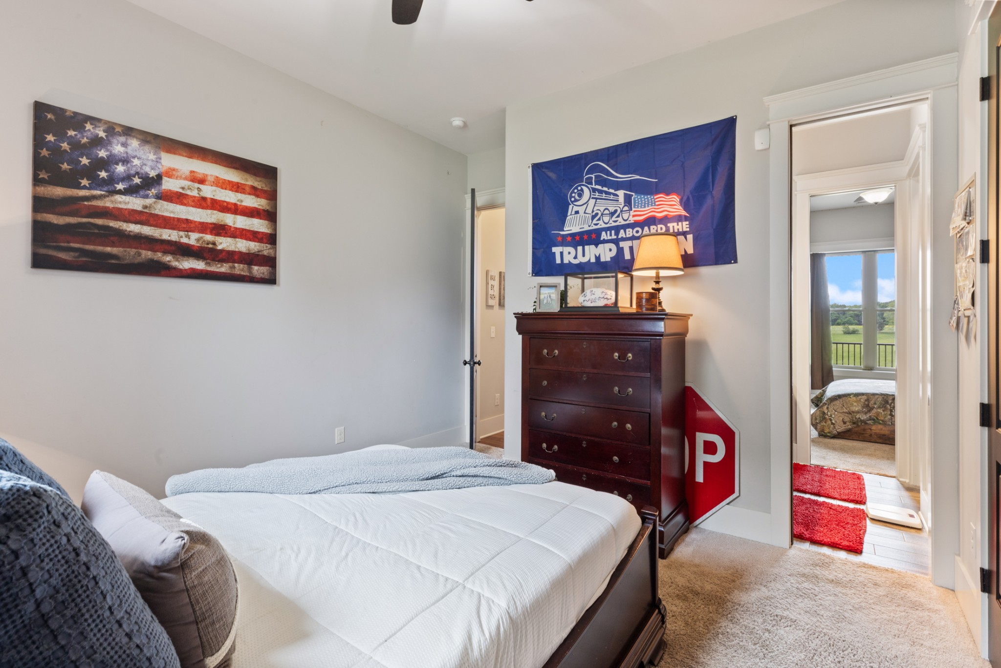 532 South Tidwell Road Bon Aqua, TN 37025 - Photo 50 of 100 a bedroom with a bed and a dresser