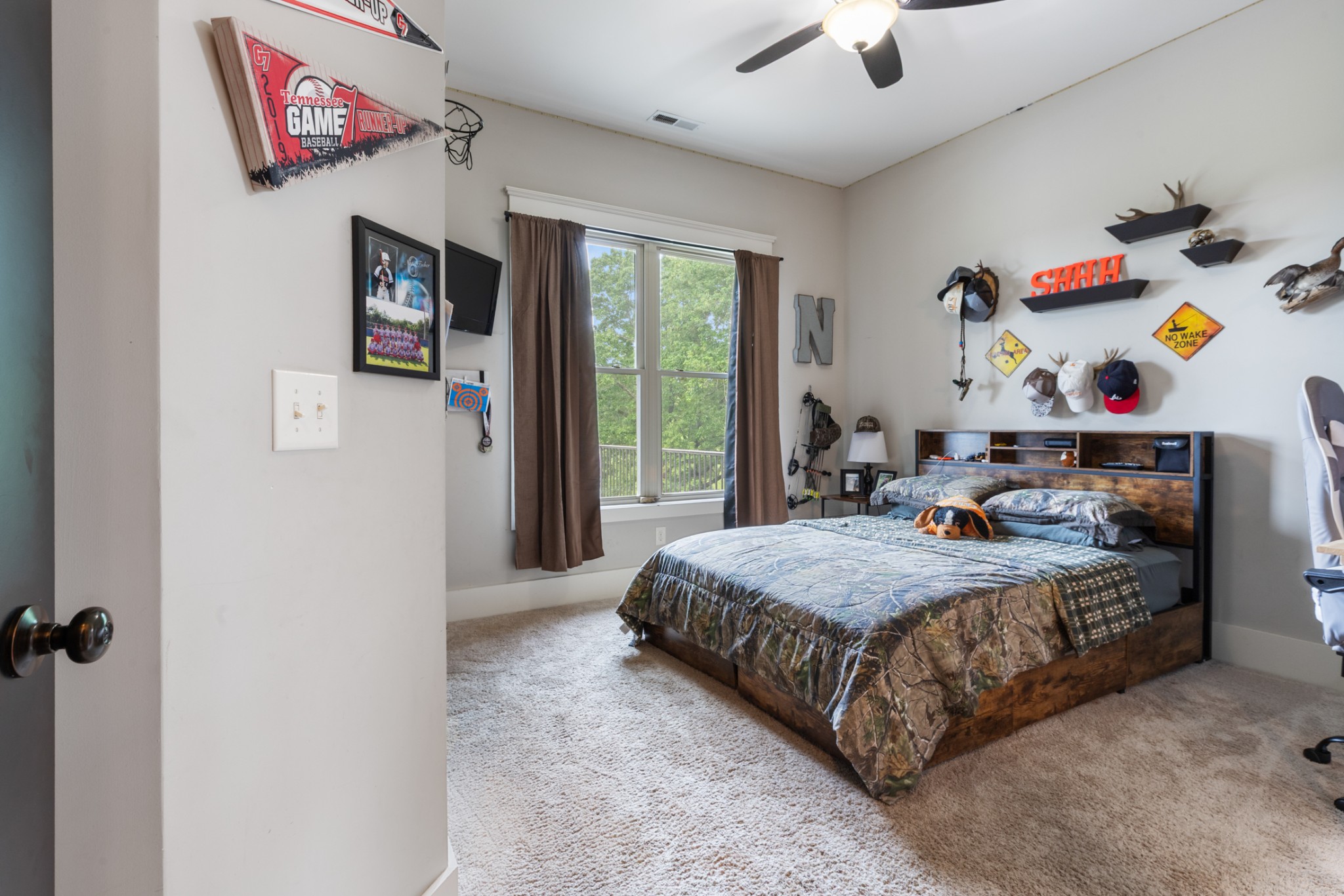 532 South Tidwell Road Bon Aqua, TN 37025 - Photo 54 of 100 a bedroom with a bed and a window