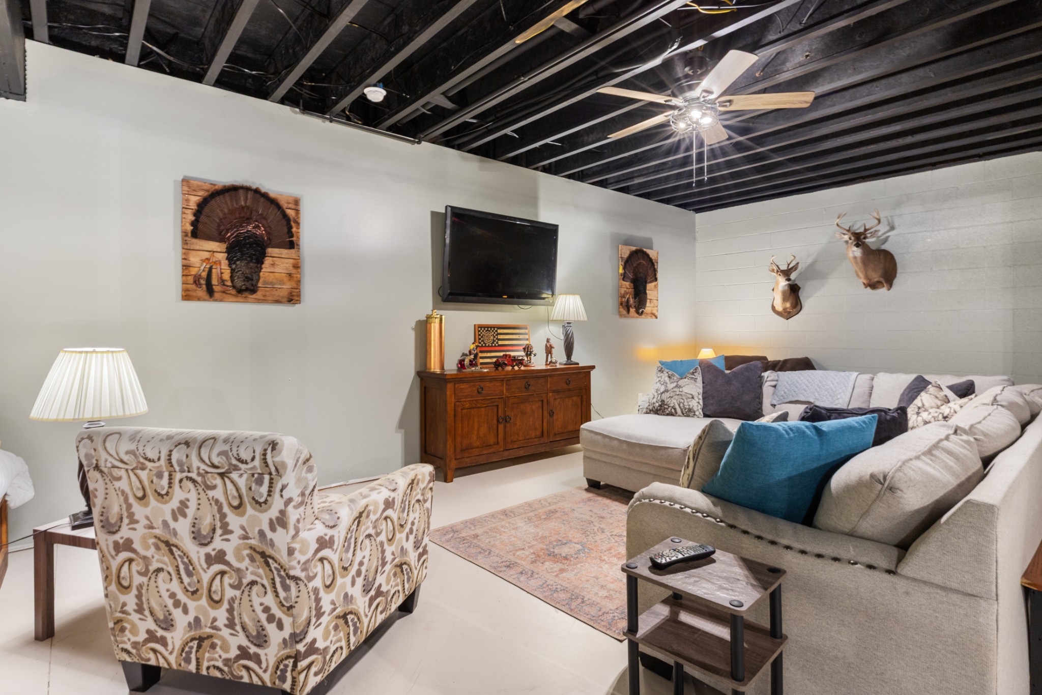 532 South Tidwell Road Bon Aqua, TN 37025 - Photo 61 of 100 a living room with furniture and a flat screen tv