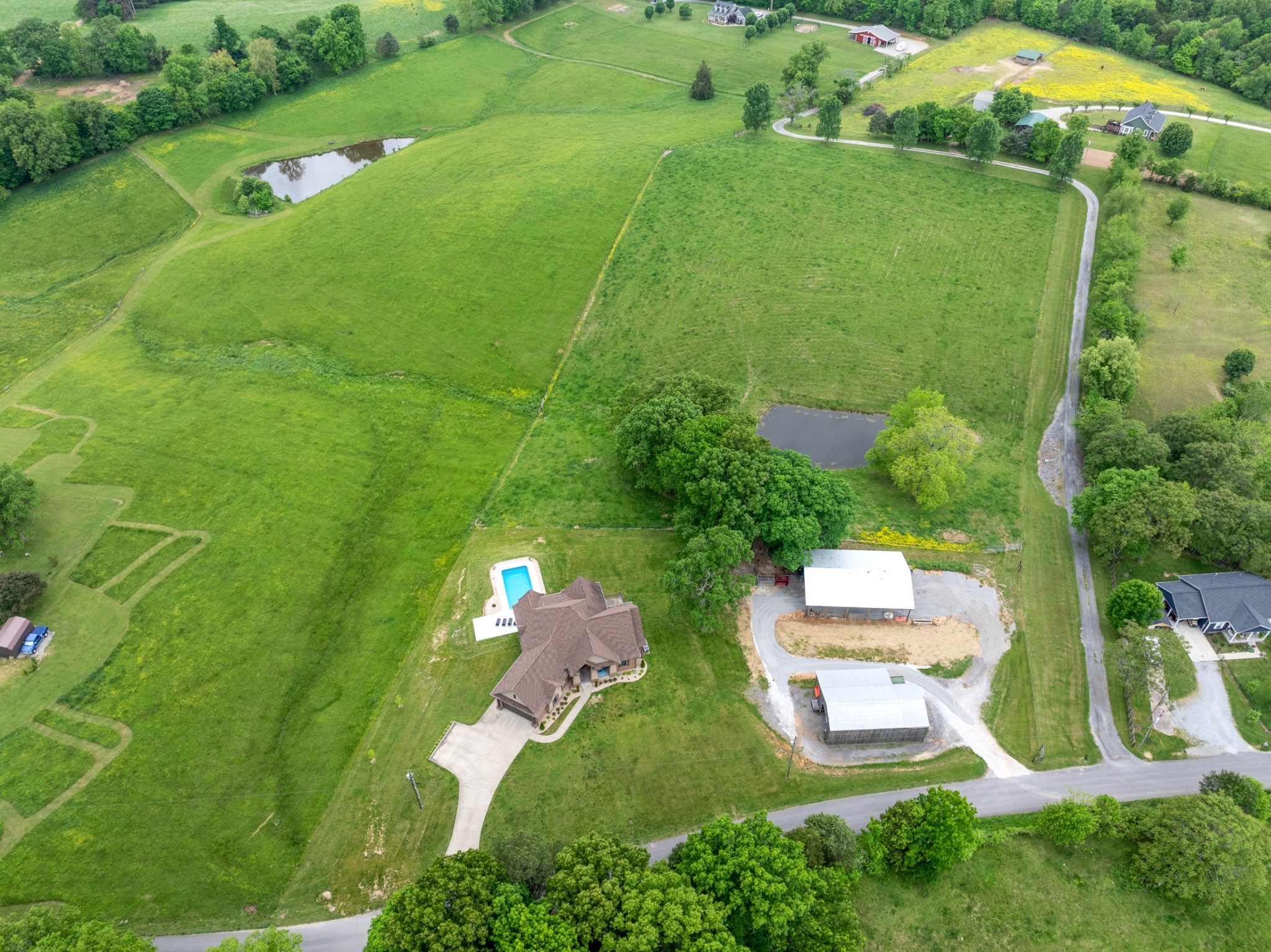 532 South Tidwell Road Bon Aqua, TN 37025 - Photo 79 of 100 an aerial view of a house with a yard basket ball court and outdoor seating