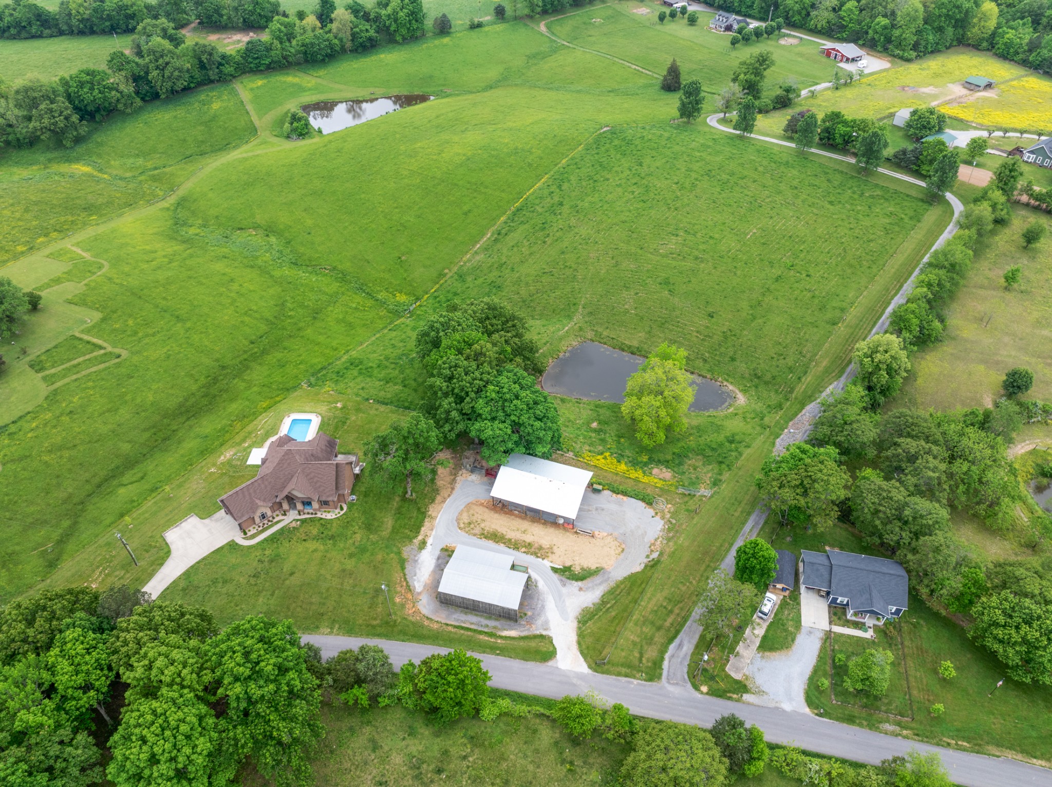 532 South Tidwell Road Bon Aqua, TN 37025 - Photo 80 of 100 an aerial view of residential houses with outdoor space and street view