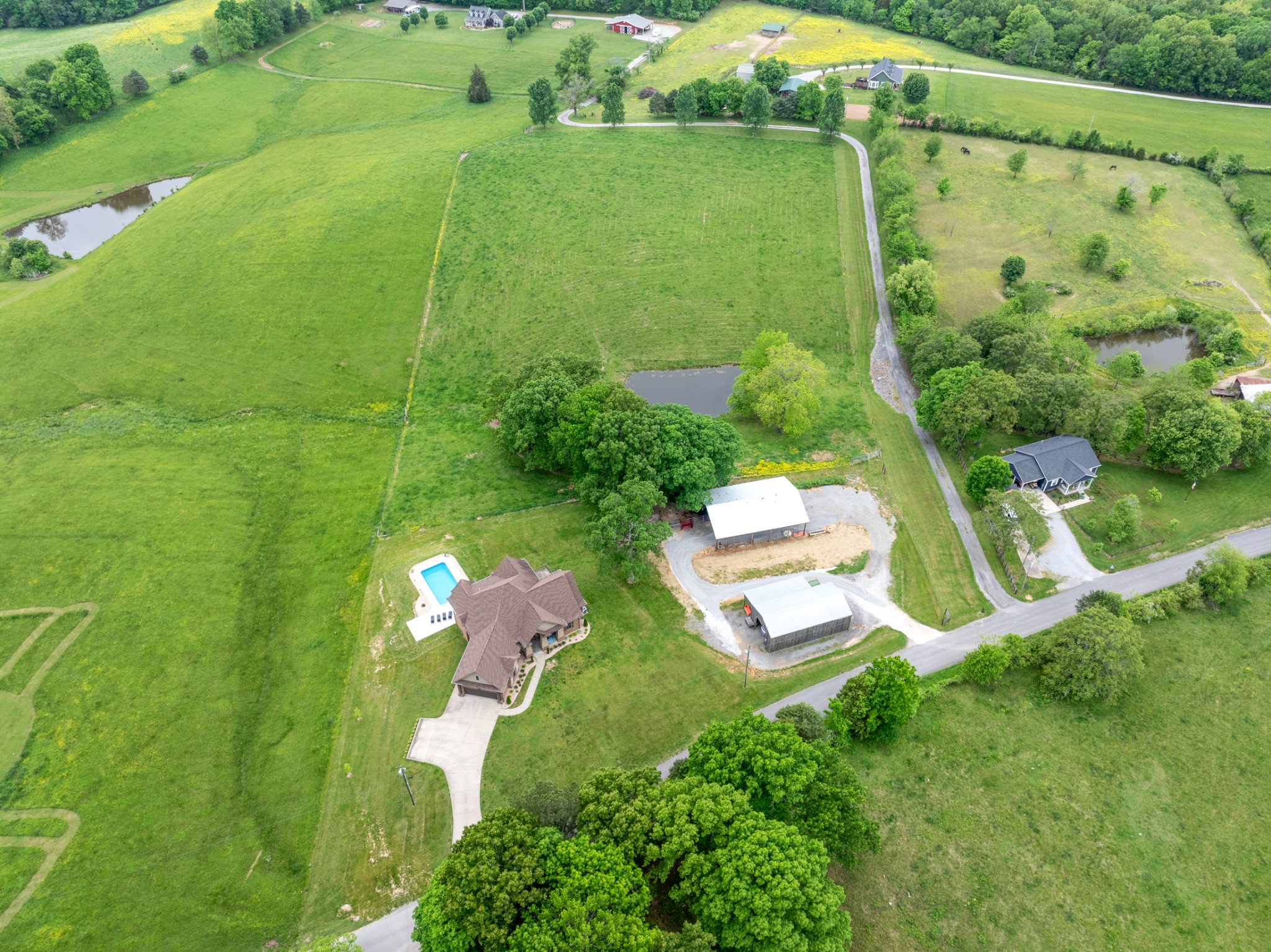 532 South Tidwell Road Bon Aqua, TN 37025 - Photo 81 of 100 an aerial view of a residential houses with outdoor space and street view