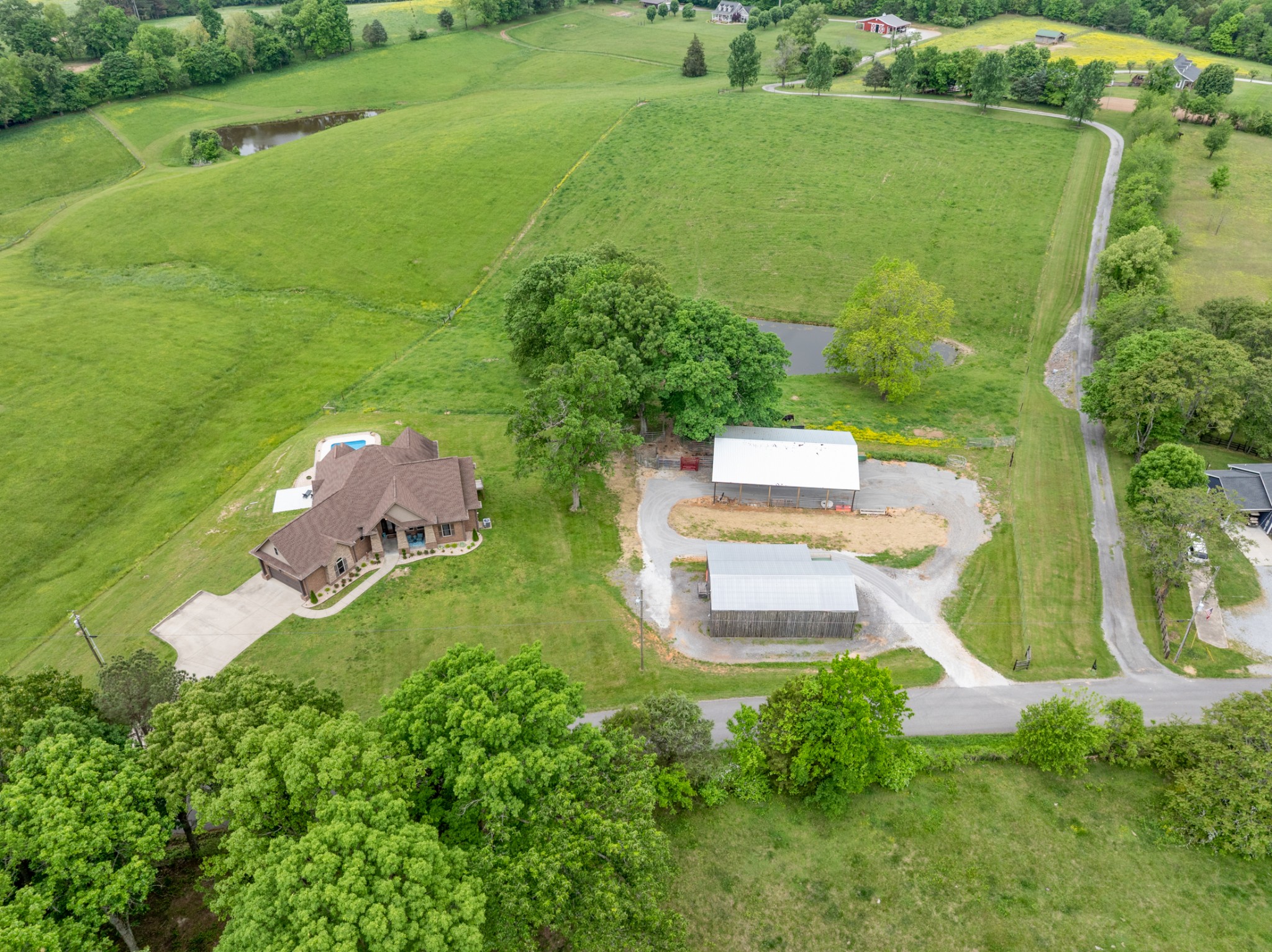 532 South Tidwell Road Bon Aqua, TN 37025 - Photo 93 of 100 an aerial view of a house with a garden
