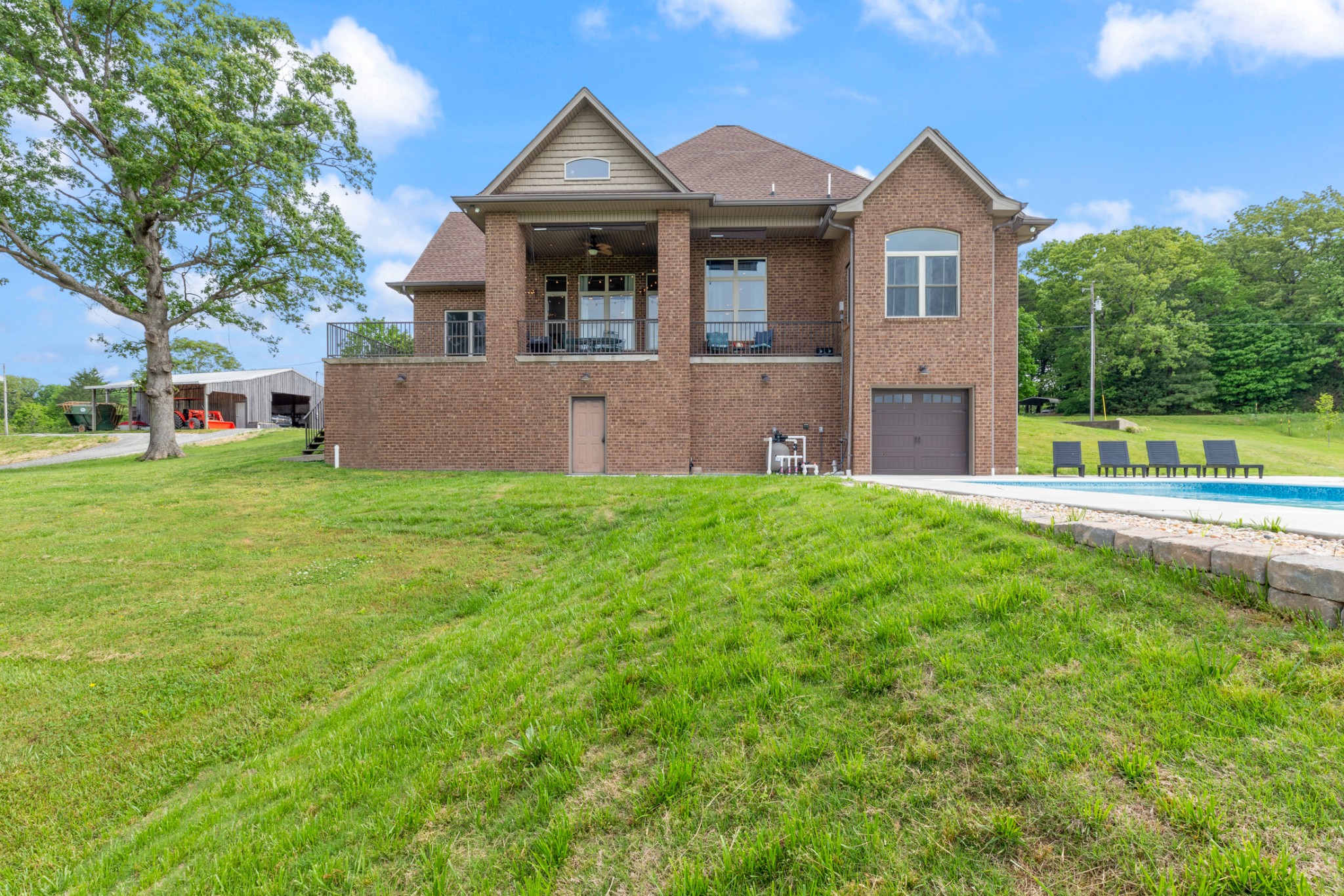 532 South Tidwell Road Bon Aqua, TN 37025 - Photo 10 of 100 a front view of a house with a yard and trees