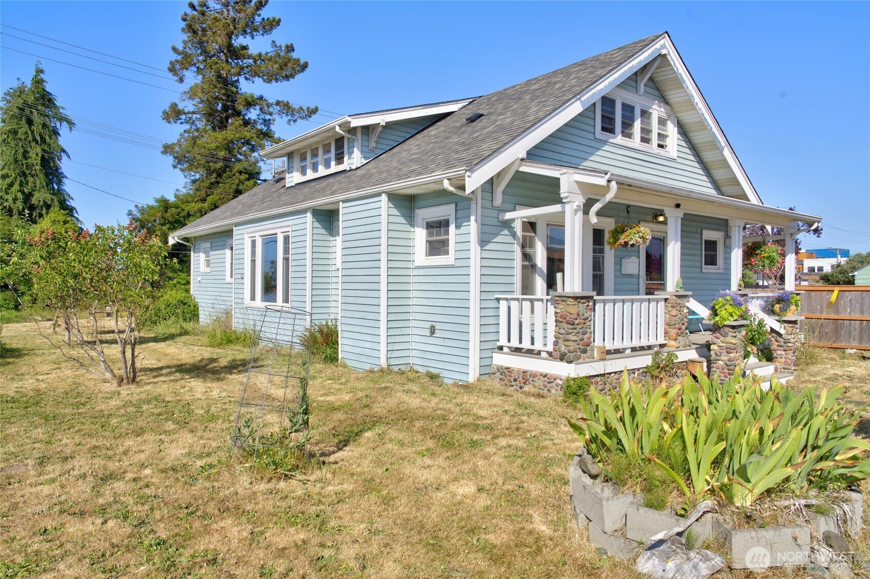 237 West 3rd Street Port Angeles, WA 98362 - Photo 38 of 40 a view of a house with wooden walls