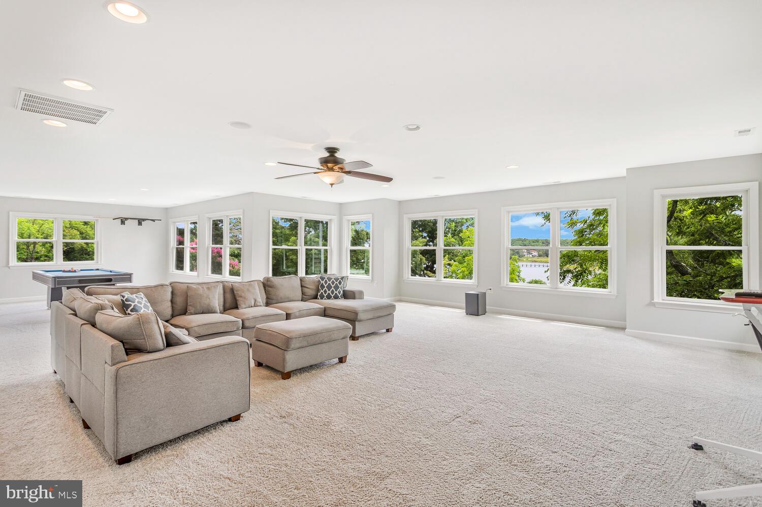 50333 Scotland Beach Road Scotland, MD 20687 - Photo 41 of 80 a living room with furniture and a large window
