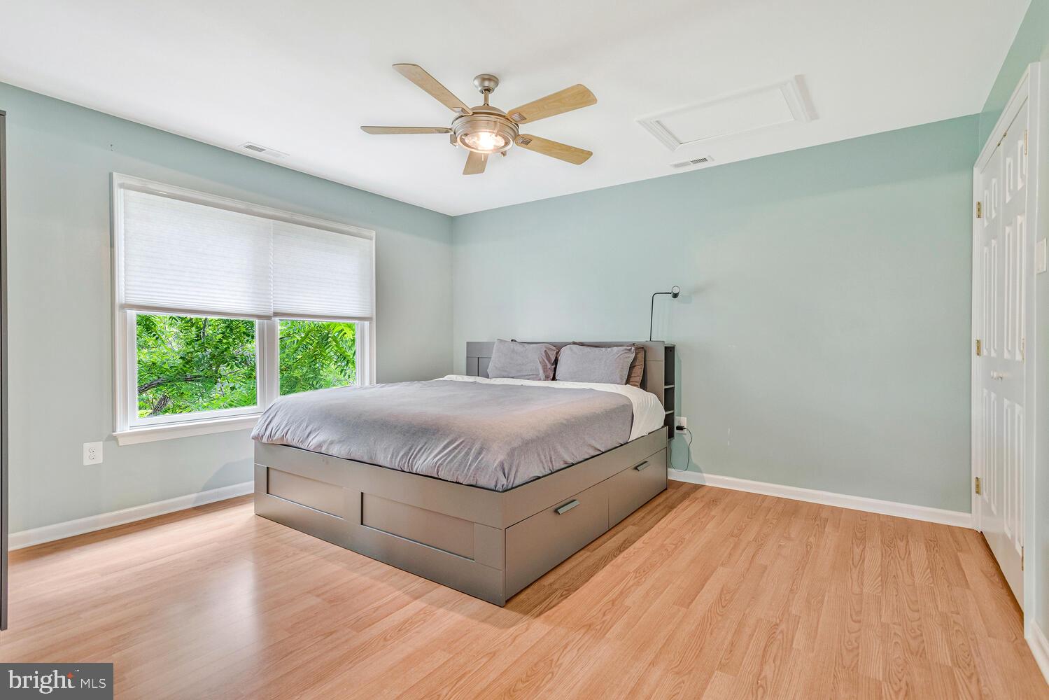 50333 Scotland Beach Road Scotland, MD 20687 - Photo 48 of 80 a bedroom with a large bed and a large window