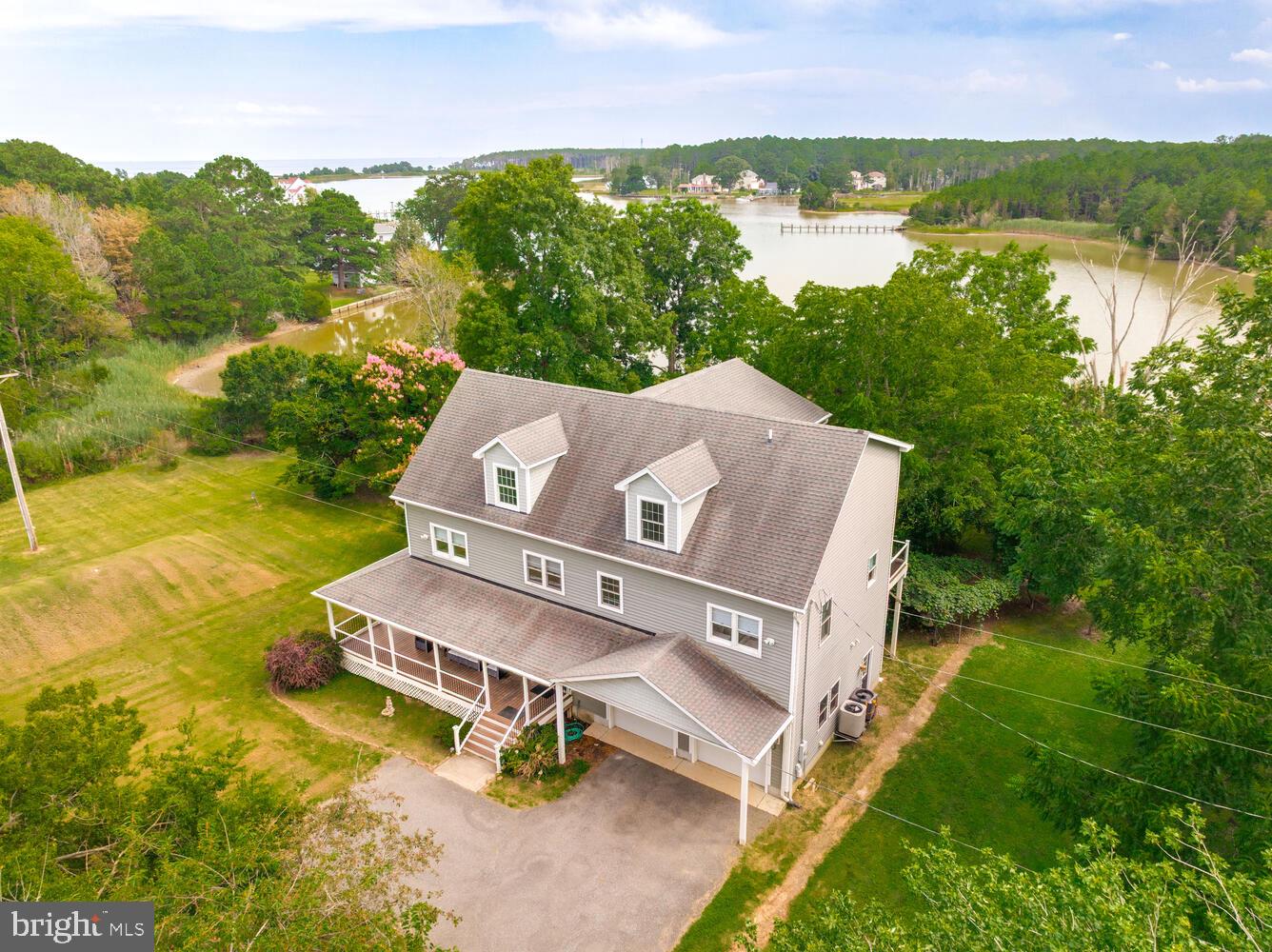 50333 Scotland Beach Road Scotland, MD 20687 - Photo 58 of 80 an aerial view of a house with garden space and outdoor seating