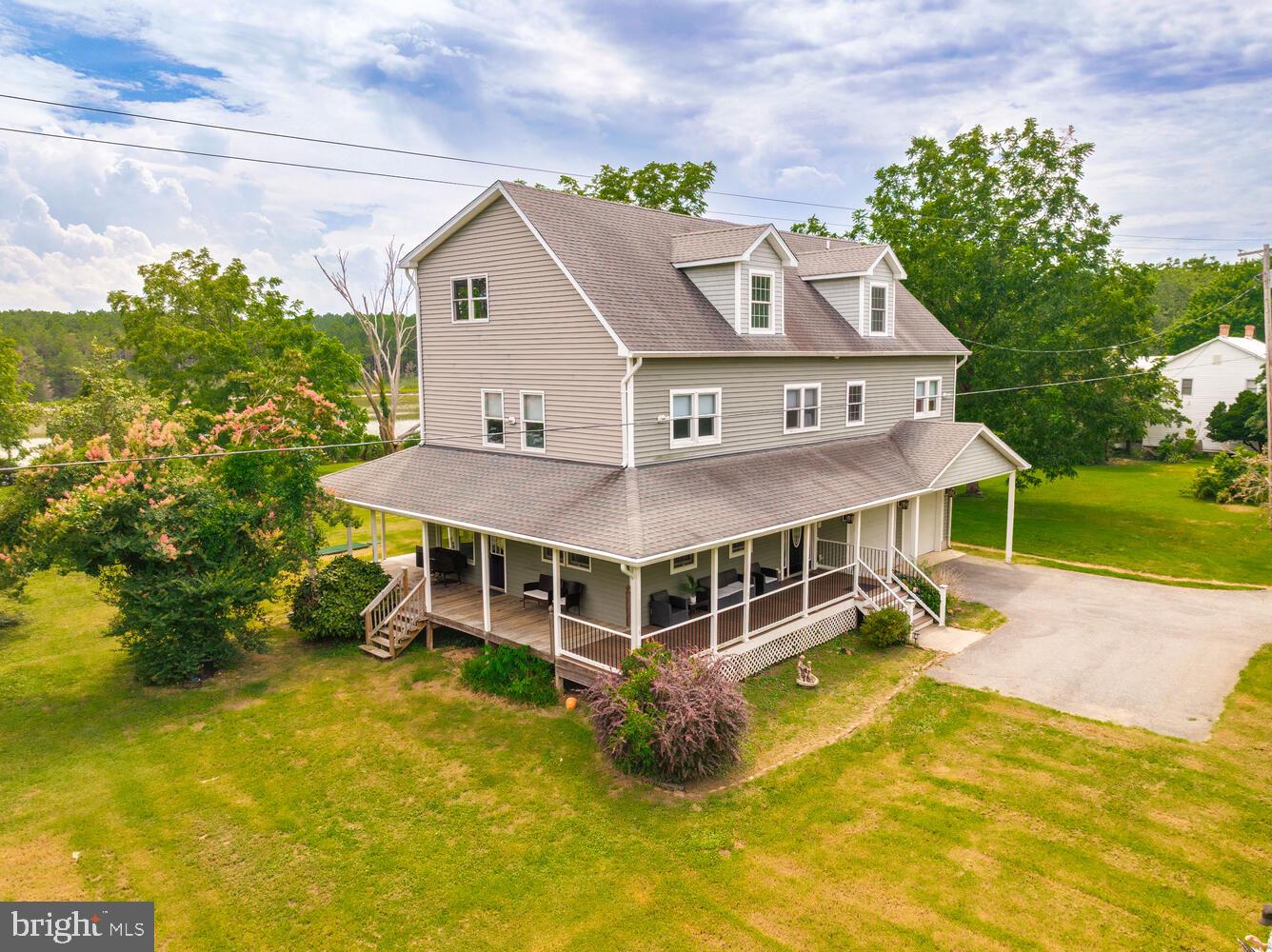 50333 Scotland Beach Road Scotland, MD 20687 - Photo 59 of 80 a view of a house with a big yard and large trees