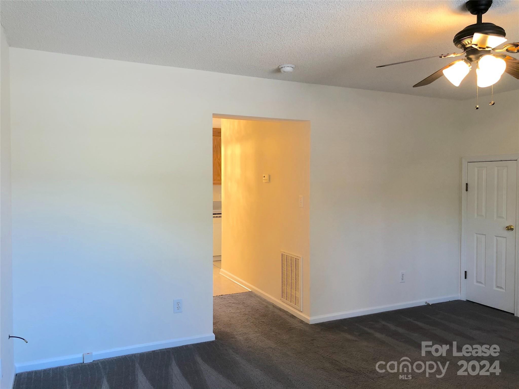 6381 Kidville Road Denver, NC 28037 - Photo 9 of 19 a view of a room with wooden floor