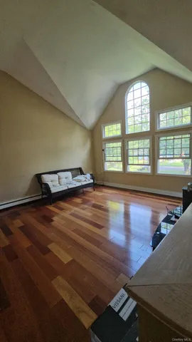 wooden floor with windows and yard