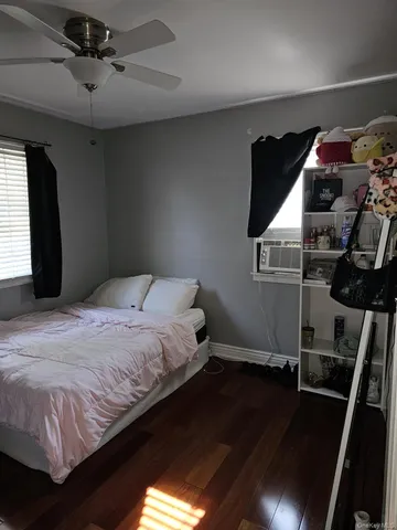 a bedroom with a bed and a walk in closet