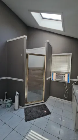 a view of a refrigerator in kitchen