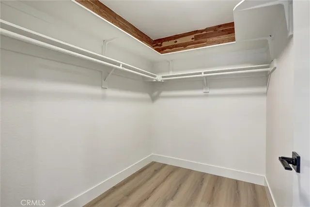 a view of a room with racks on the wall