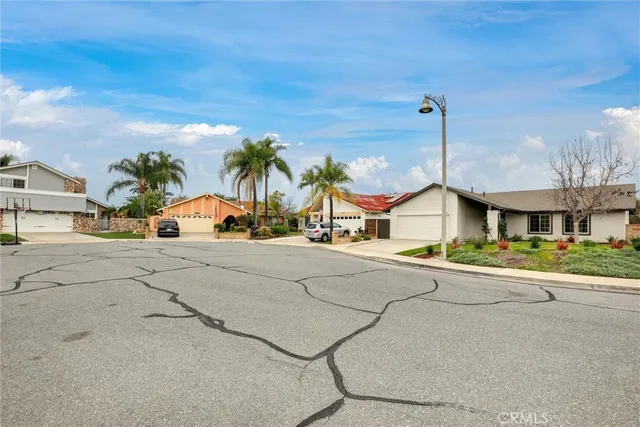a front view of a building with street view