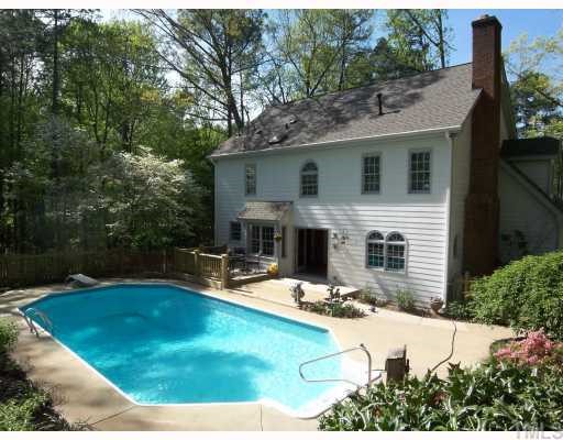 2809 Patrie Place Raleigh, NC 27613 - Photo 11 of 12 New French doors open to your private backyard with in-ground pool