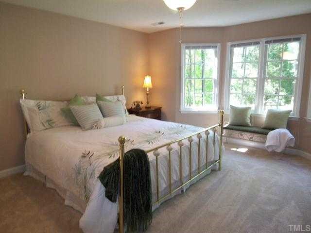 2809 Patrie Place Raleigh, NC 27613 - Photo 5 of 12 Bright and airy master bedroom with bay window area