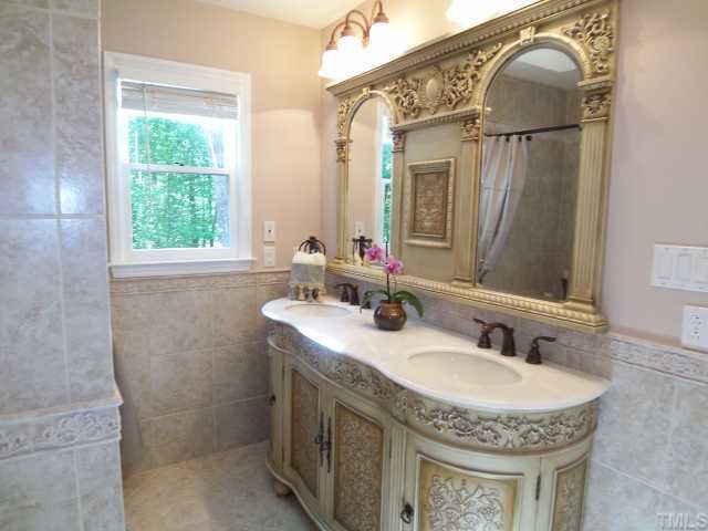 2809 Patrie Place Raleigh, NC 27613 - Photo 6 of 12 Beautiful tiled master bath has double sinks... what you can't see is a jet tub!