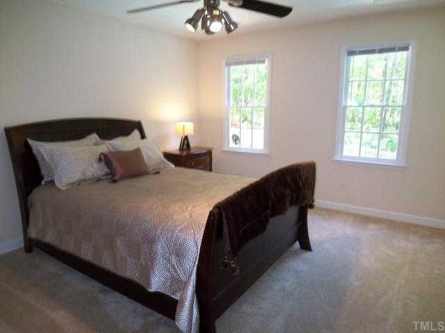 2809 Patrie Place Raleigh, NC 27613 - Photo 7 of 12 Large secondary bedroom with ceiling fan
