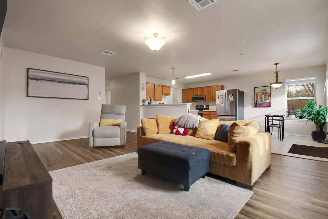 18205 Topsail Street Manor, TX 78653 - Photo 11 of 29 Living area with light wood-type flooring