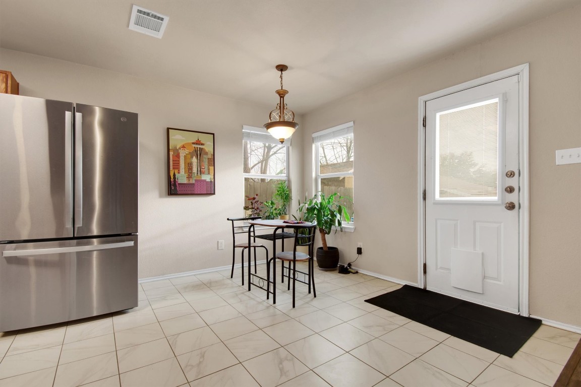 18205 Topsail Street Manor, TX 78653 - Photo 14 of 29 Dining room with baseboards
