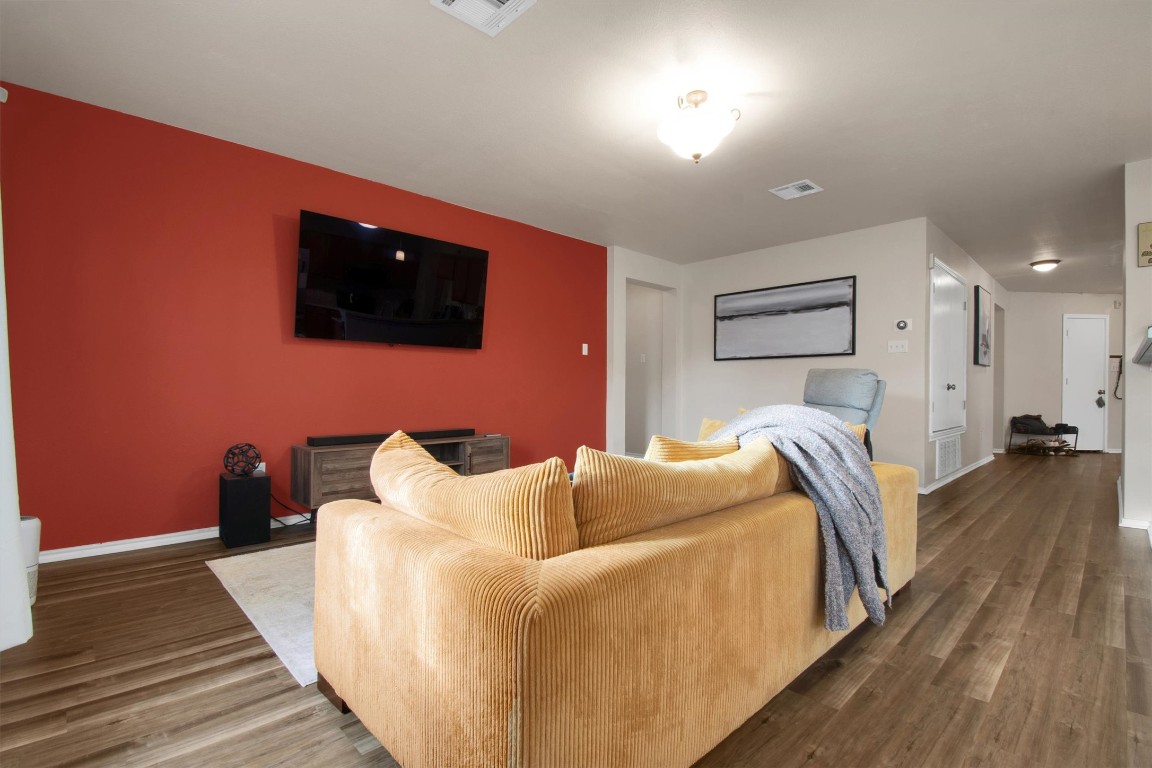 18205 Topsail Street Manor, TX 78653 - Photo 8 of 29 Living area featuring dark wood-style floors
