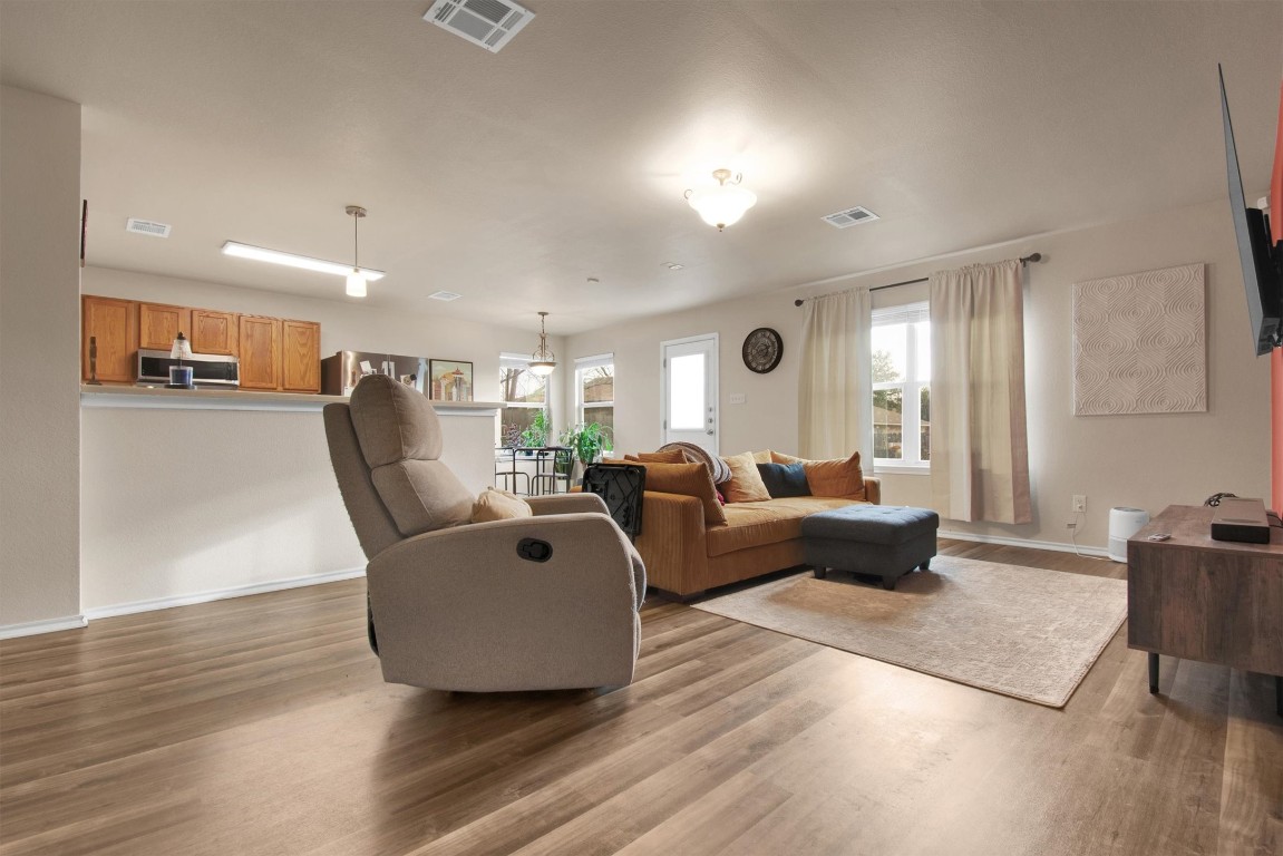 18205 Topsail Street Manor, TX 78653 - Photo 9 of 29 Living area with light wood-type flooring