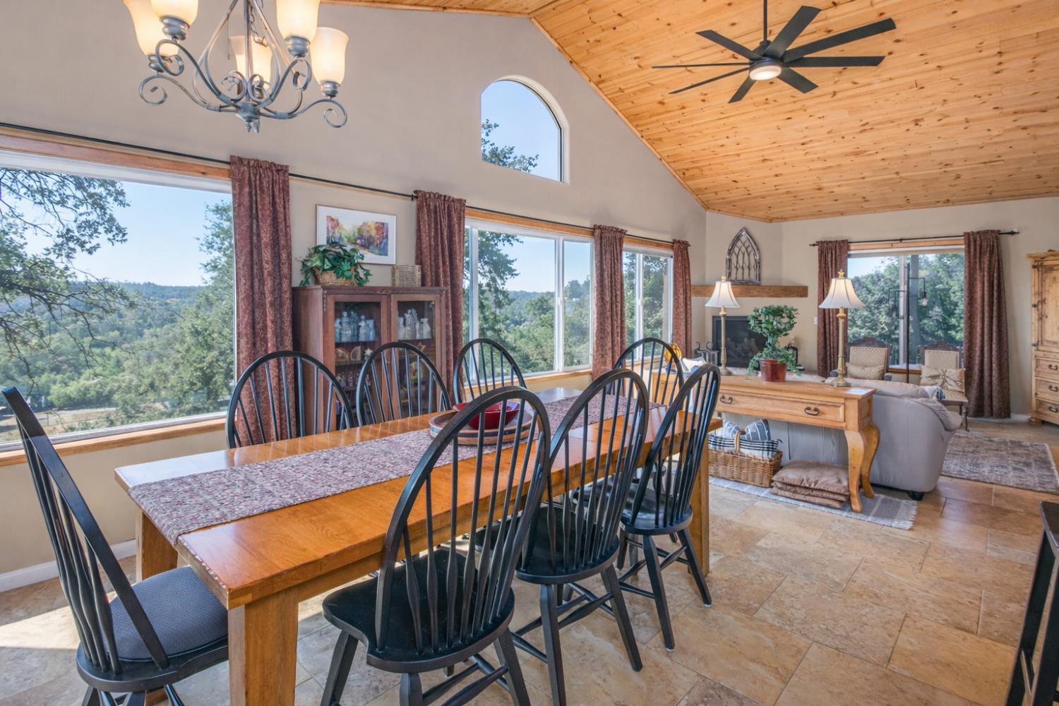 9290 Cramer Road Auburn, CA 95602 - Photo 17 of 67 a view of a dining room with furniture window and outside view