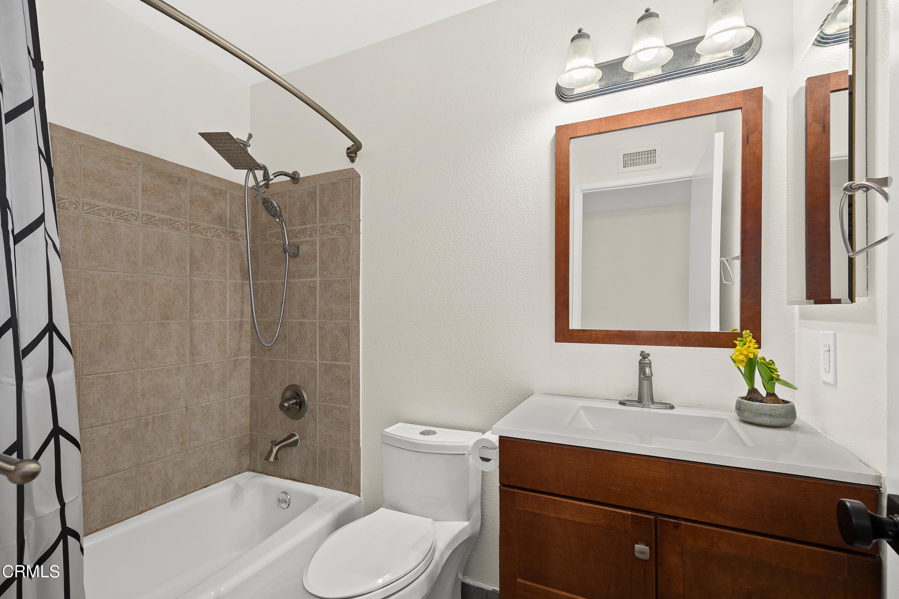 585 West Duarte Road, Unit 24A Arcadia, CA 91007 - Photo 16 of 23 a bathroom with a sink vanity mirror and toilet