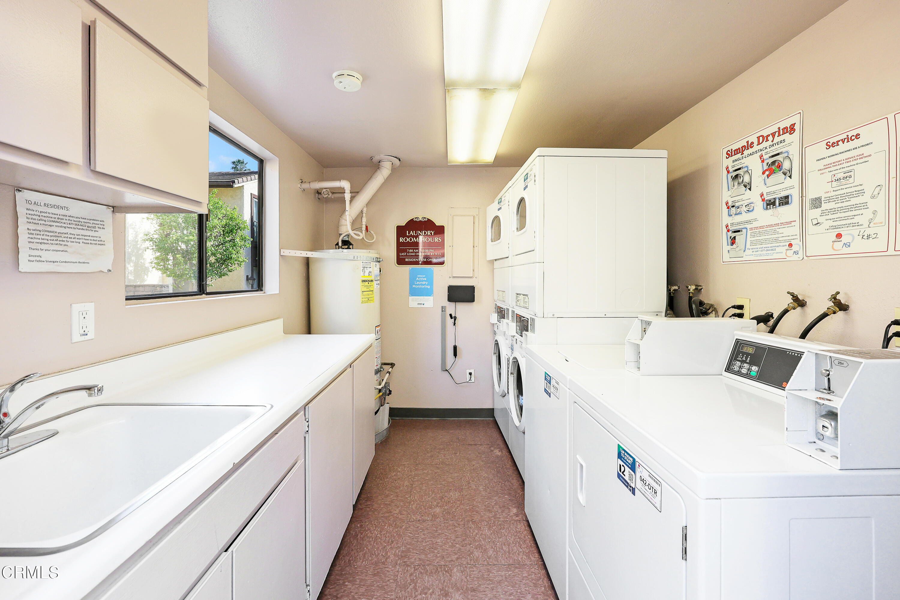 585 West Duarte Road, Unit 24A Arcadia, CA 91007 - Photo 21 of 23 a view of a kitchen with a sink and wooden floor