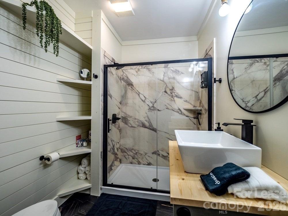 306 North Salem Avenue Sumter, SC 29150 - Photo 5 of 5 a bathroom with a sink and a mirror
