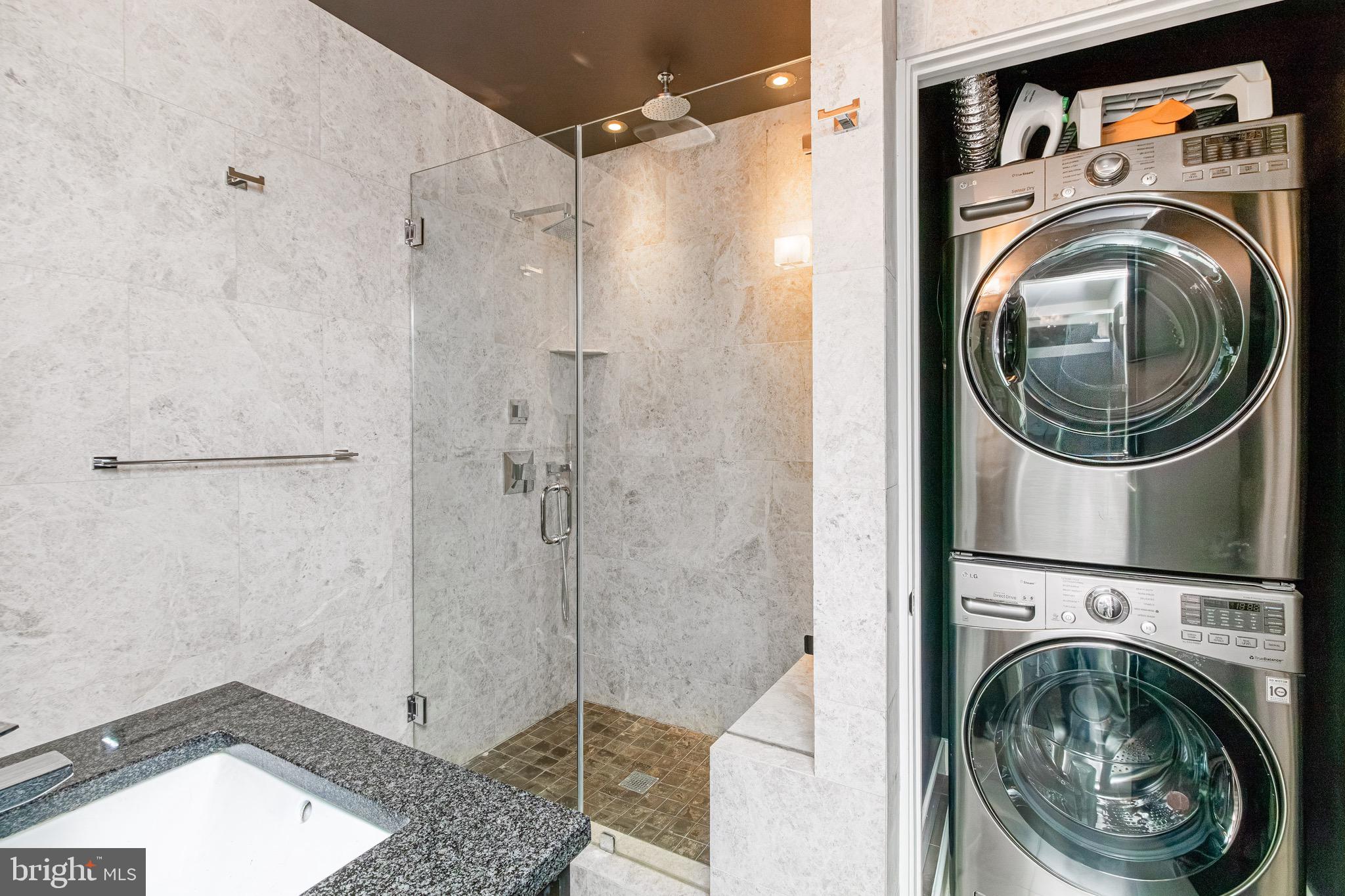 2360 Champlain Street Northwest, Unit B2 Washington, DC 20009 - Photo 6 of 10 a view of a bathroom with washing machine